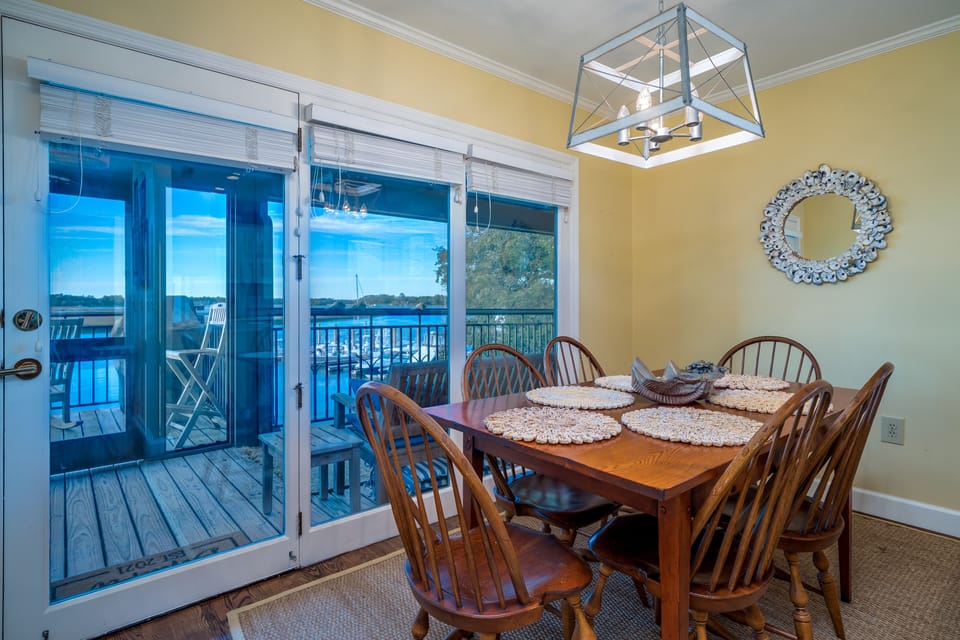 Dining table adjacent to kitchen