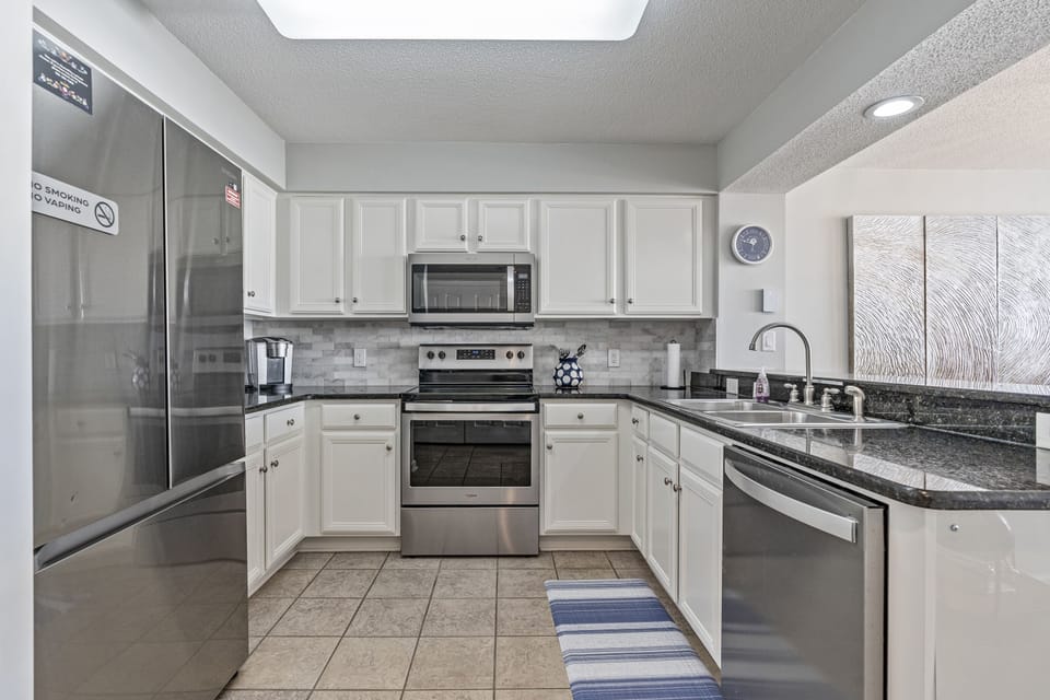 An updated kitchen makes preparing meals a breeze.