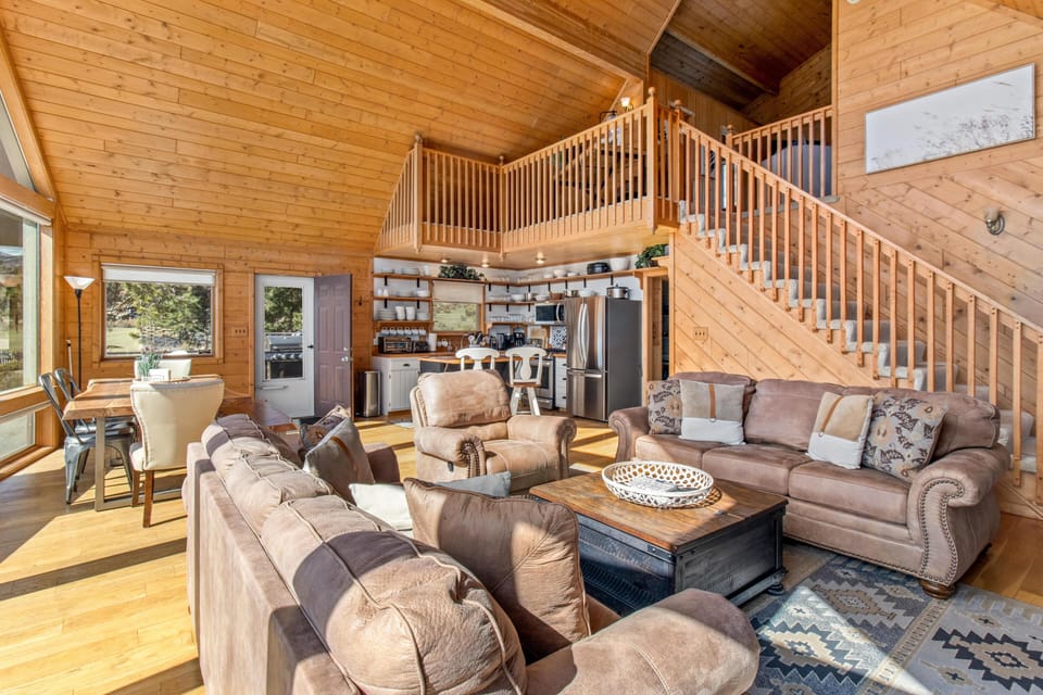Spacious living room with vaulted ceilings and cozy seating