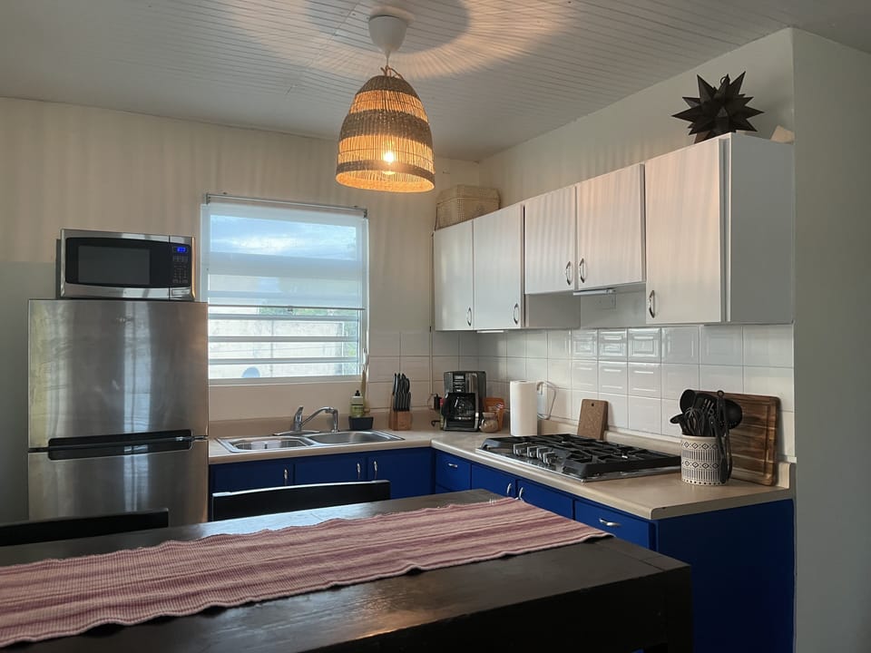 Fully equipped kitchen to cook or eat-in