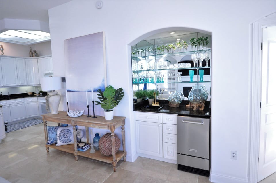 Wet Bar on the 2nd floor has a sink, ice machine, and glassware.