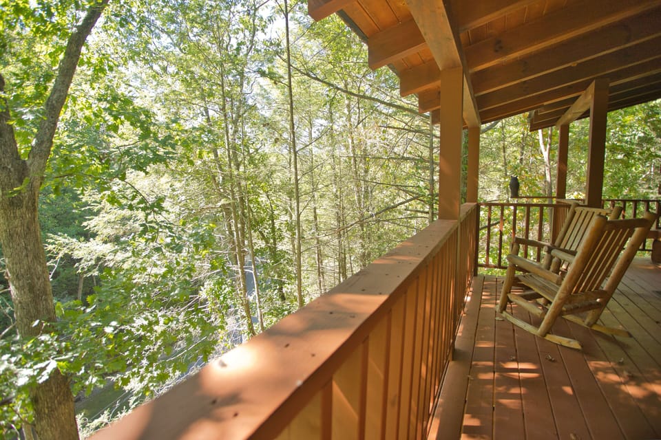 Sit on the rocking chairs on the upper deck- take in the forest & creek below