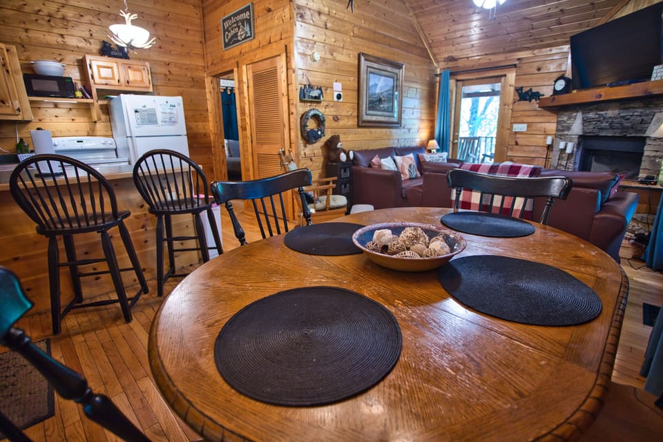 Open concept main floor with dinning, living, kitchen, master bed and bath