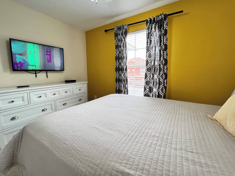 Queen bedroom located near a shared hallway bathroom