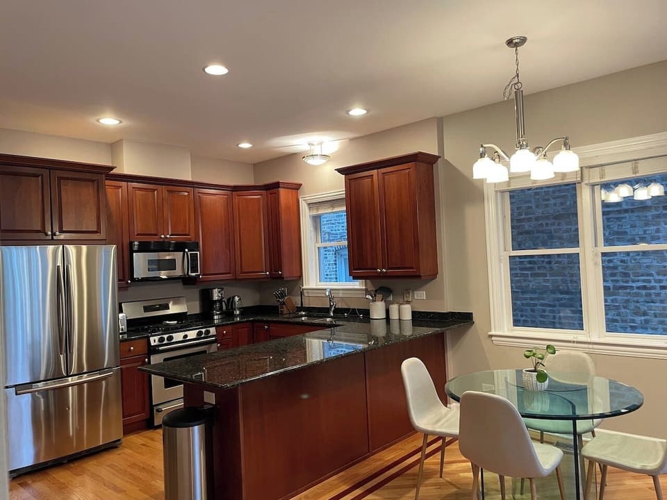 Modern kitchen layout with planty of prep space and storage for group stays