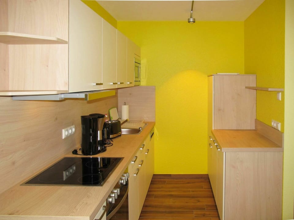 Cabinetry, Property, Kitchen Stove, Building, Kitchen Appliance, Wood, Lighting, Interior Design, Home Appliance, Countertop