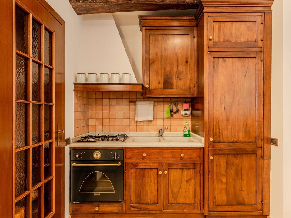 Cabinetry, Wood, Kitchen, Furniture, Interior Design, Flooring, Cupboard, Countertop, Major Appliance, Brown