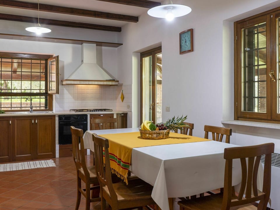 Table, Furniture, Window, Property, Cabinetry, Countertop, Chair, Wood, Lighting, Interior Design