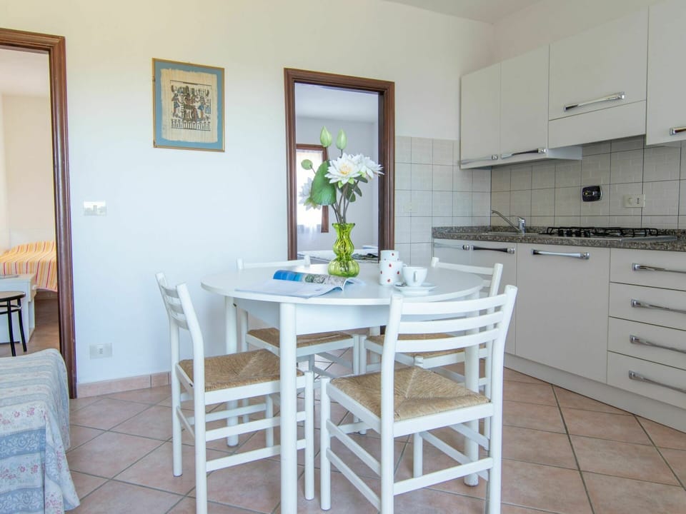 Furniture, Property, Cabinetry, Table, Picture Frame, Countertop, Azure, Wood, Chair, Interior Design