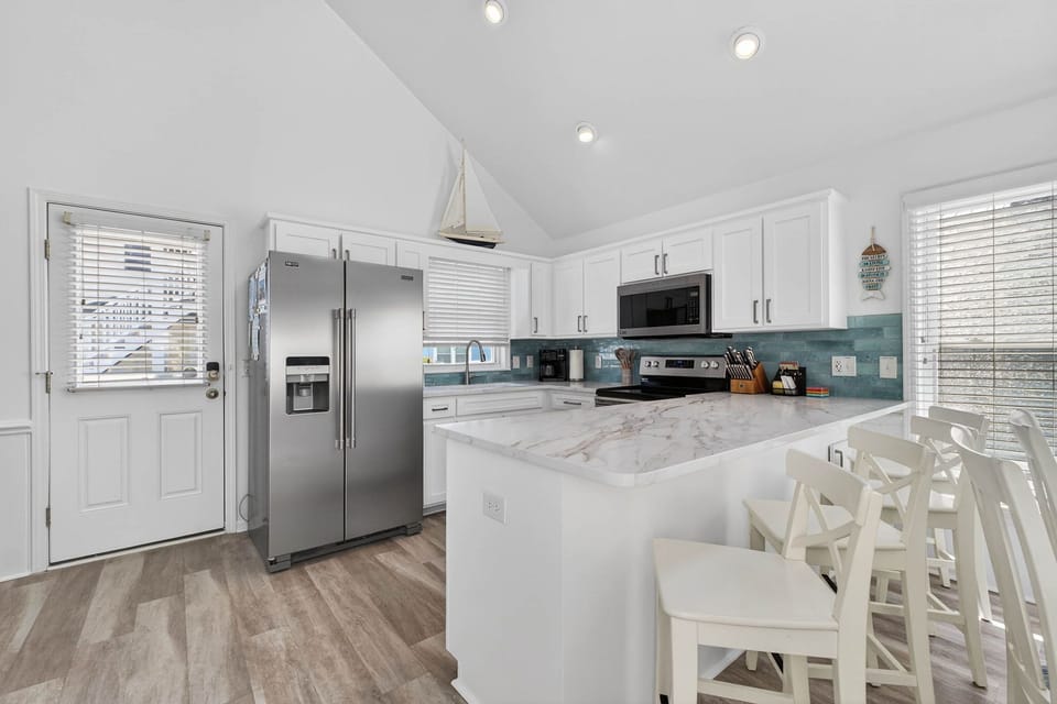 Remodeled fully stocked kitchen.