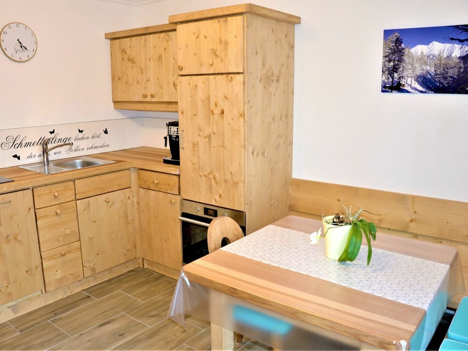 Cabinetry, Furniture, Countertop, Table, Property, White, Sink, Building, Green, Wood