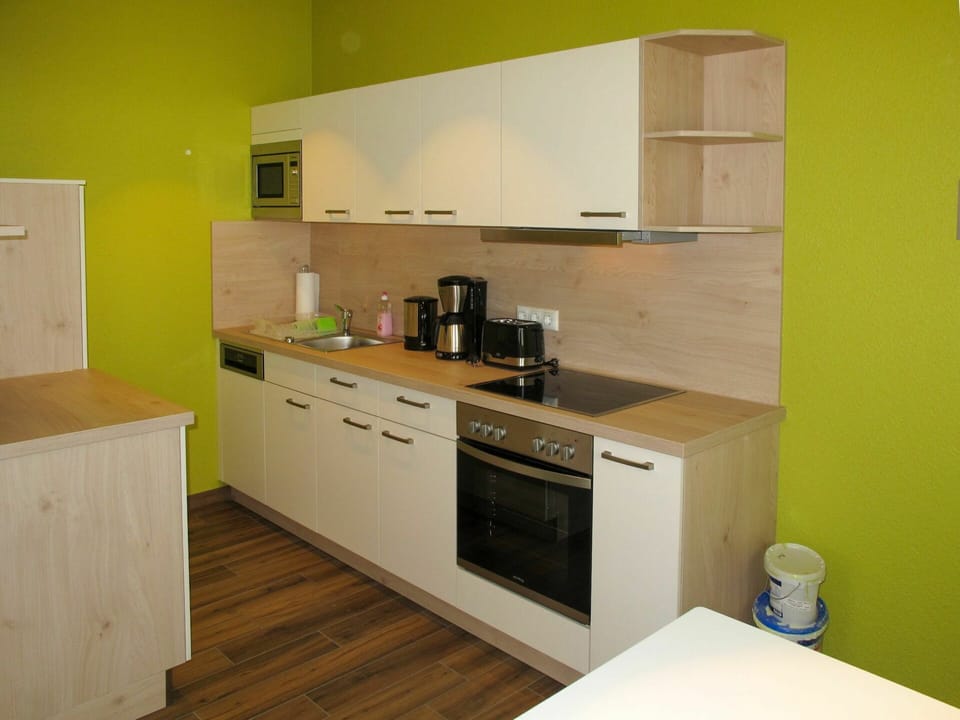 Tap, Kitchen Sink, Cabinetry, Sink, Countertop, Plumbing Fixture, Kitchen Stove, Kitchen Appliance, Building, Drawer