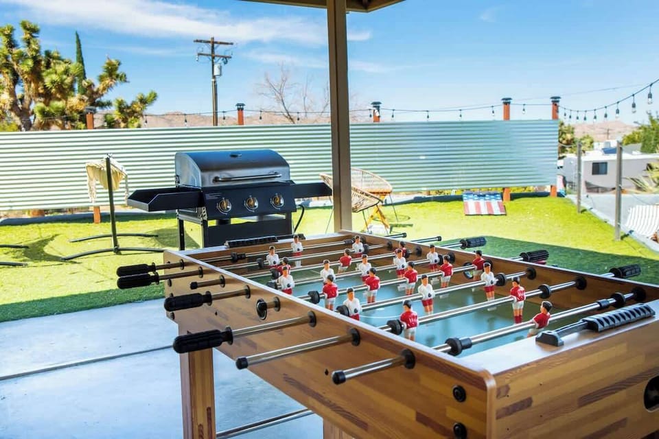 While you wait for the grill to finish, challenge your buddies to a game of foosball.