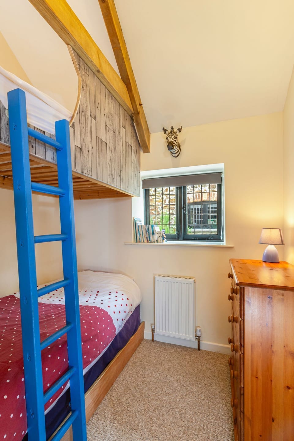 Second bedroom with bunk beds. The lower bunk bed suitable for an adult.