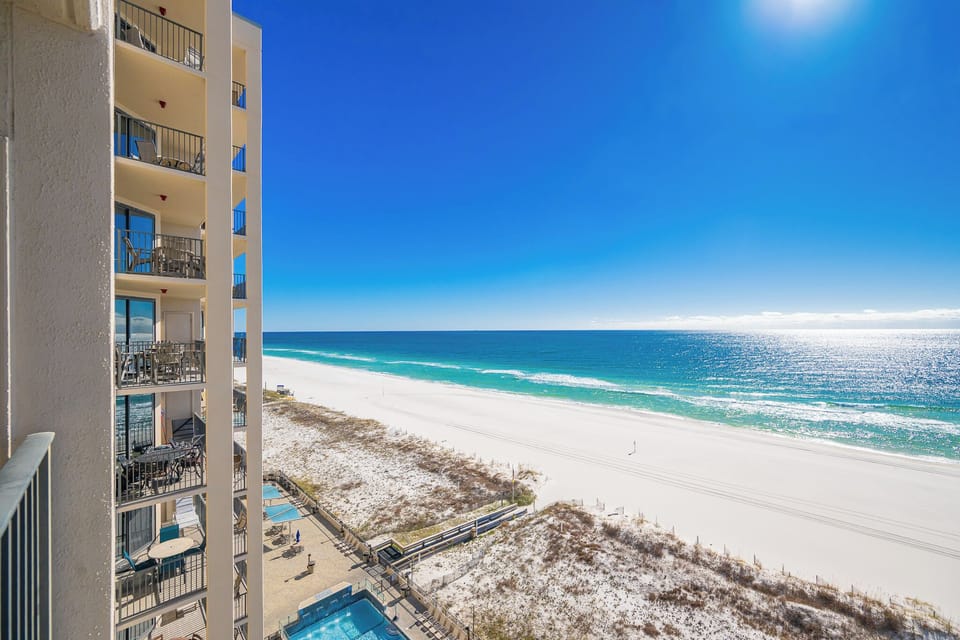 Enjoy stunning views of the turquoise waters and coastline from your balcony, perfect for relaxation and soaking in the sun