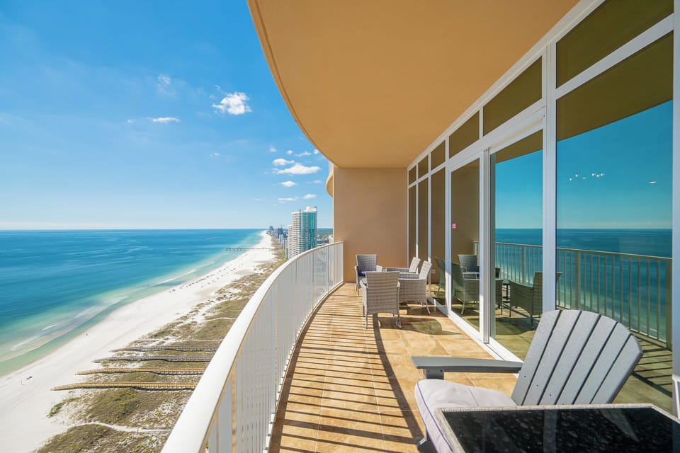 Experience seemingly endless coastline views of the horizon as waves lap the shore and the sun glistens over the water