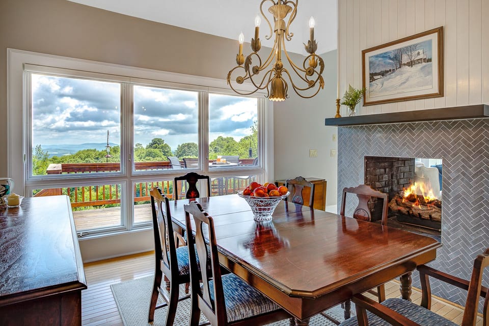 Sweeping views from the dining room, with a fireplace for cozy winter dinners 