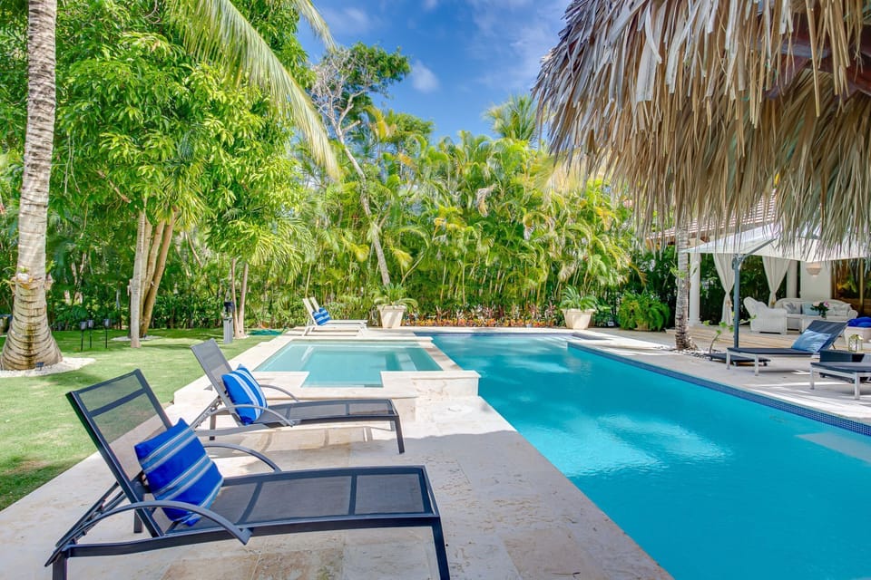 Extensive pool with hot tub, outdoor living, bbq, cabana and garden