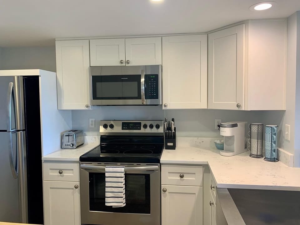 Fully stocked, updated and sparkling clean kitchen.