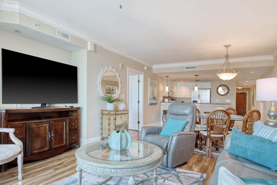Spacious living and dining area with cozy coastal charm