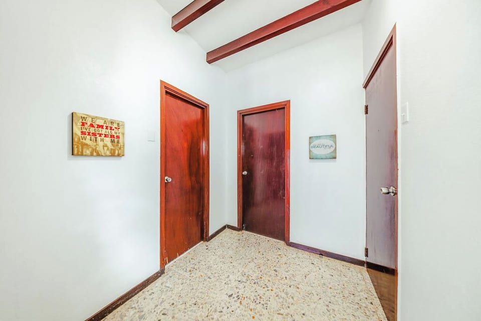 The hallway leads to the bedroom