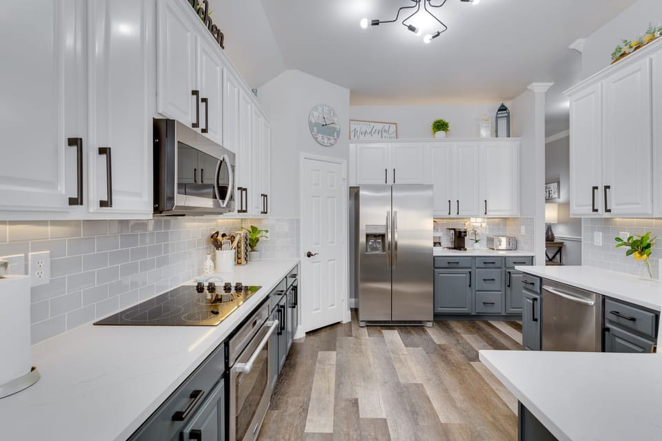 Kitchen with a lot of kitchen essentials. 