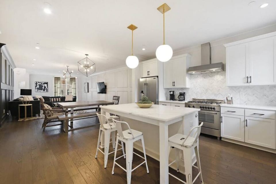 Spacious open floor plan with luxurious lighting.