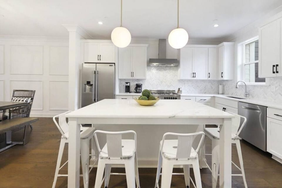 Cookware, glassware, toaster, blender & utensils in this fully stocked kitchen.