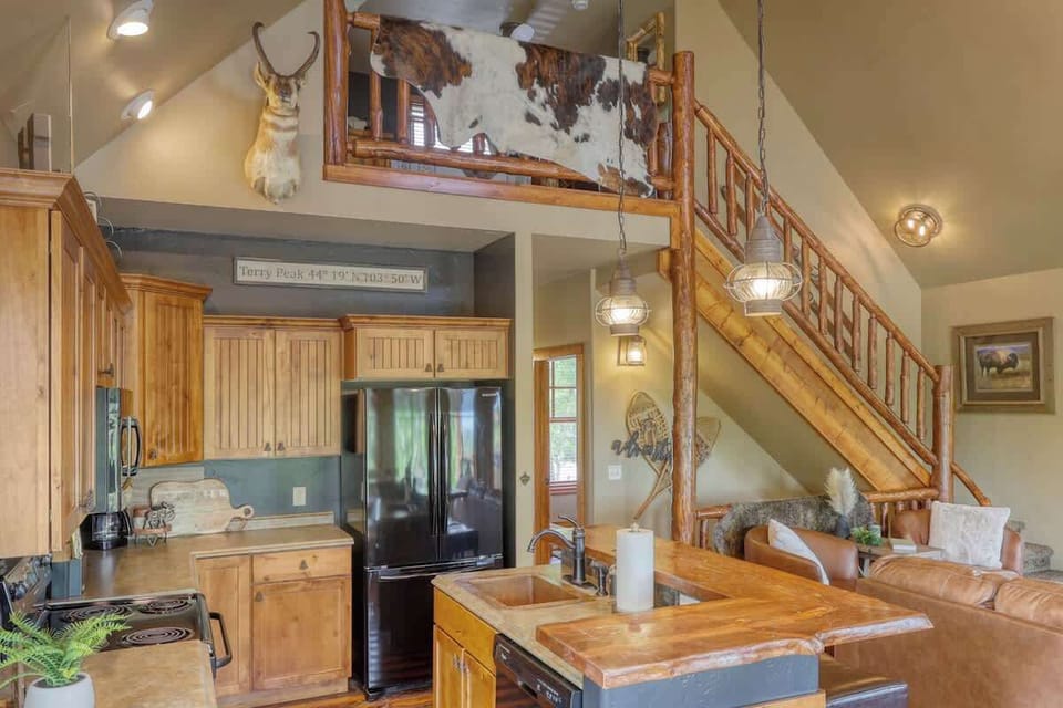 Beautiful wood stair case leading to open loft