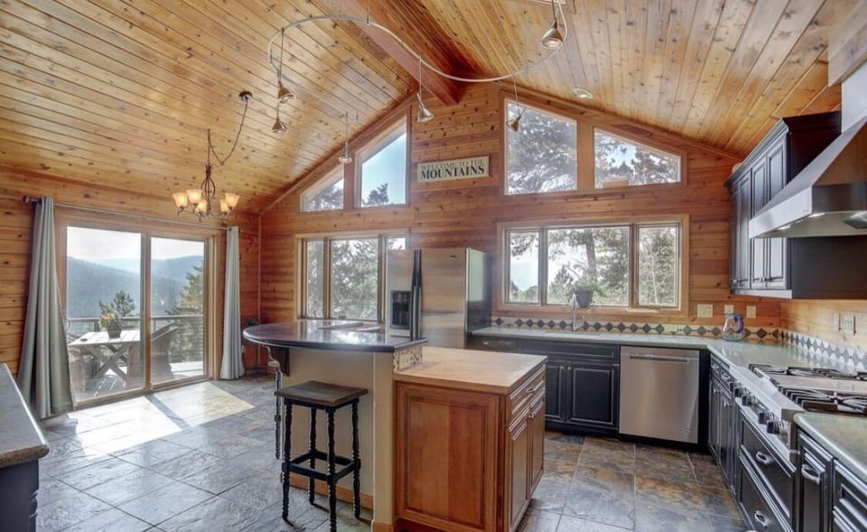 large kitchen with tile floors