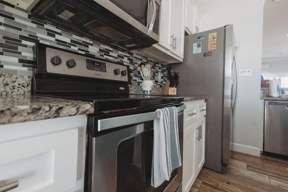 Stainless steel appliances, fully equipped and stocked for all your needs.