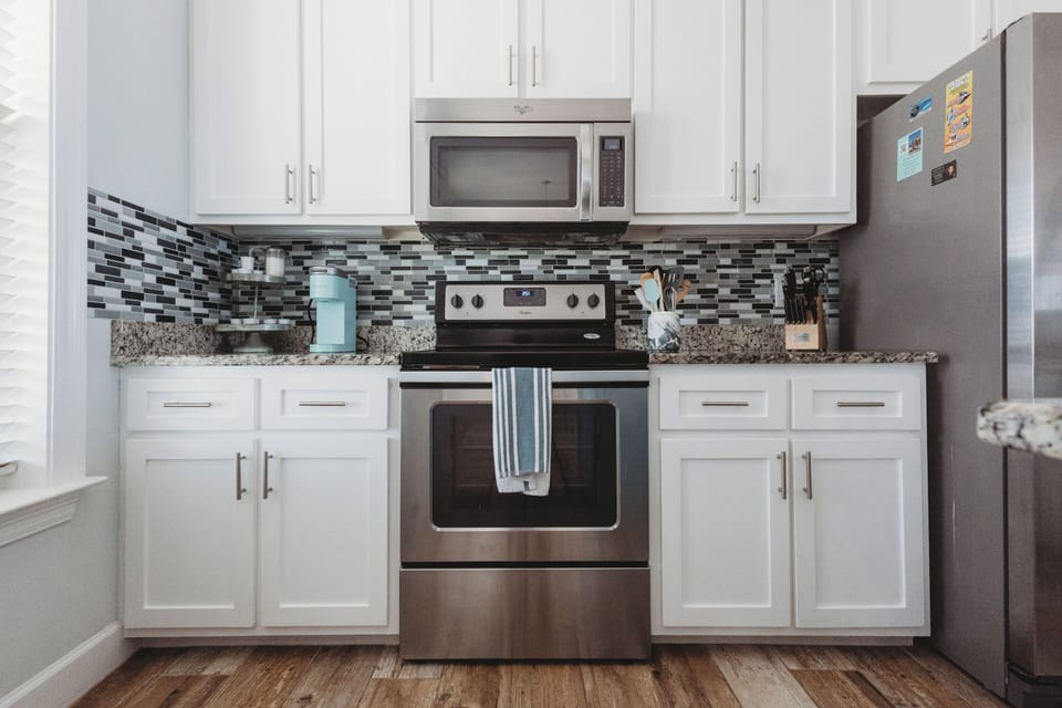 The well-appointed kitchen has everything a cook could need.