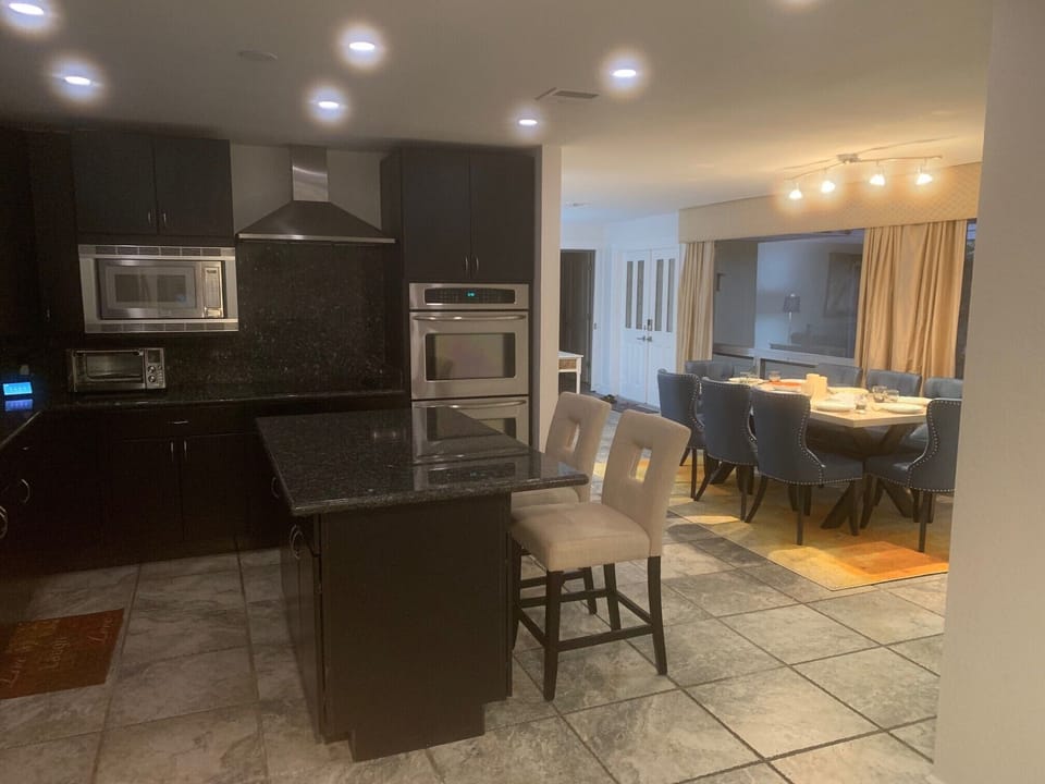 Open concept with the dinning area tying together the kitchen and Living Rooms.