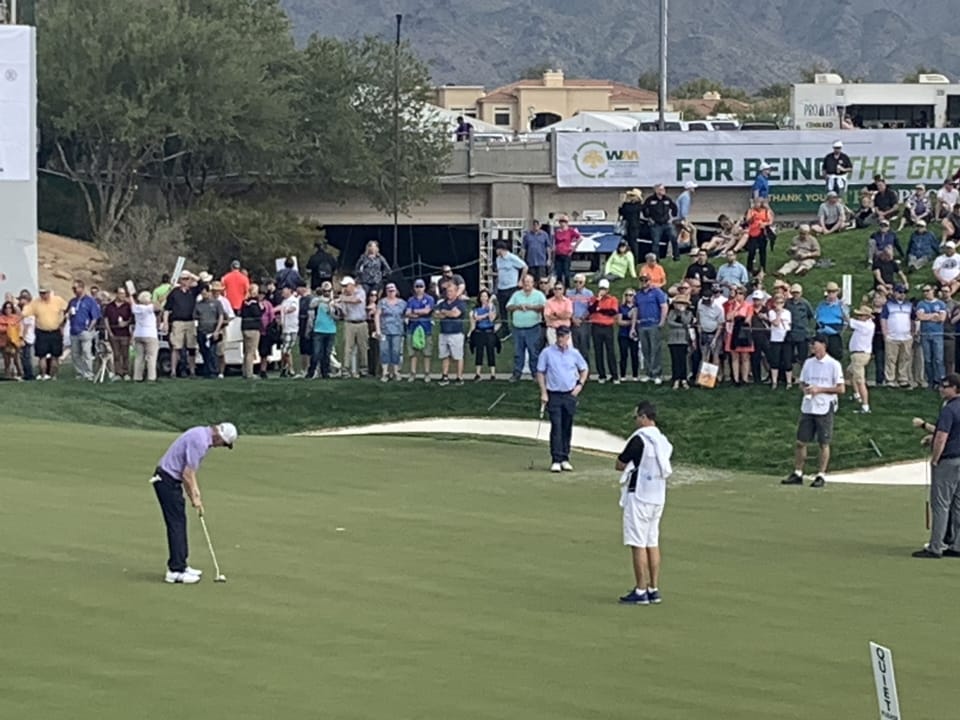 18th green. Look above the white sign, you will see a beige condo, that’s ours! 
