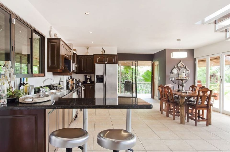 View of kitchen and dining area.