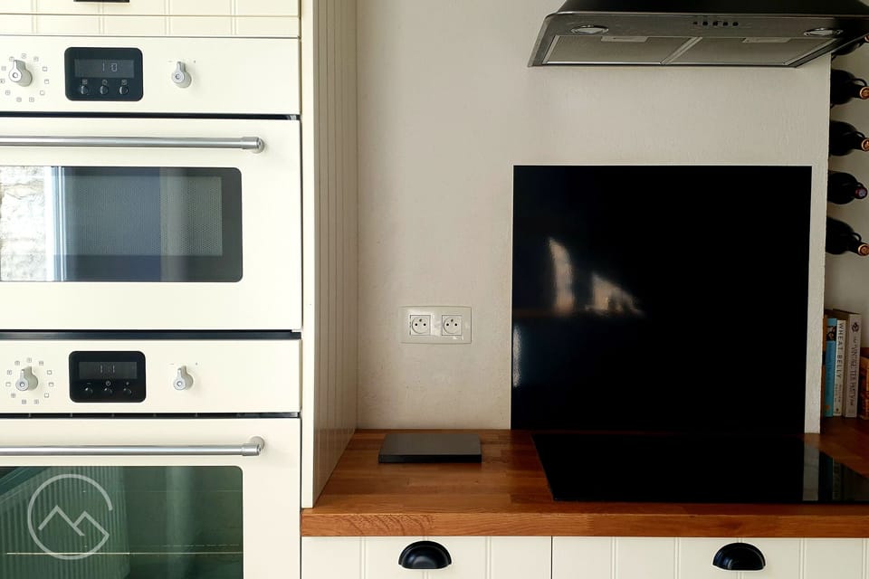Our kitchen is equipped with a new double oven, microwave, grill & induction hob