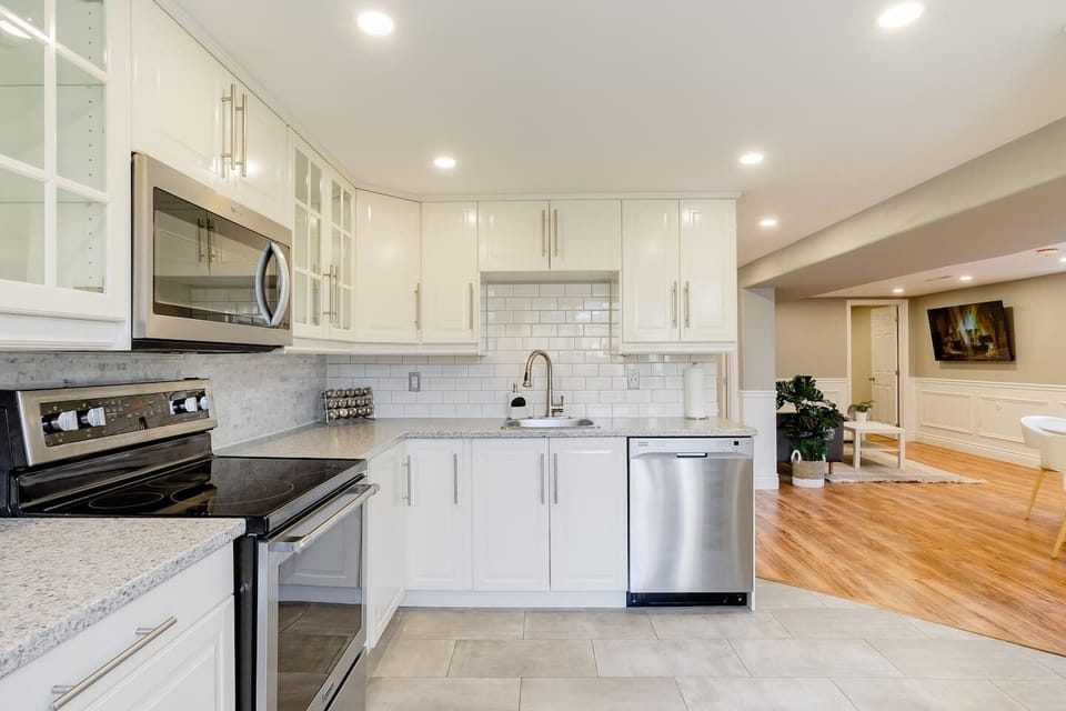 Open concept kitchen, dining/living area