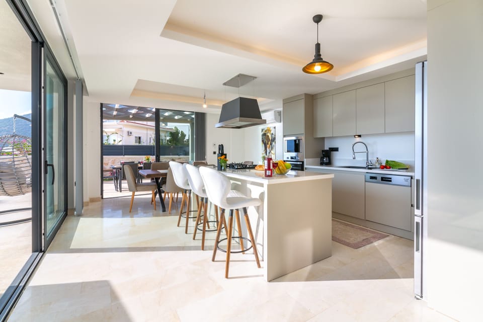 Open plan fully fitted kitchen with an island unit