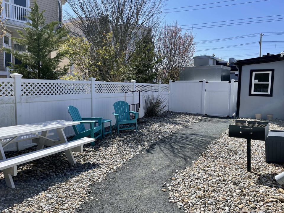 Shared space in back of the building. Grill, picnic table, and bike rack