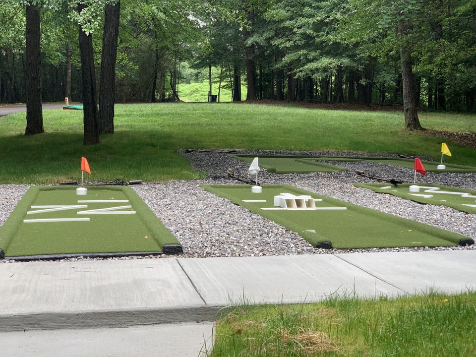 9 hole mini golf nestled along the long driveway
