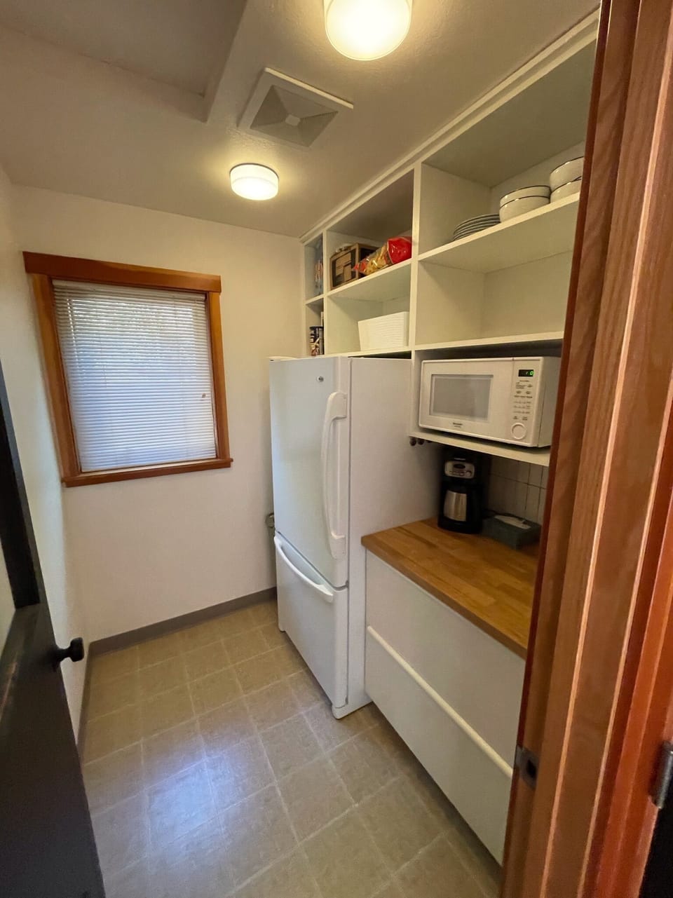 Pantry with second fridge