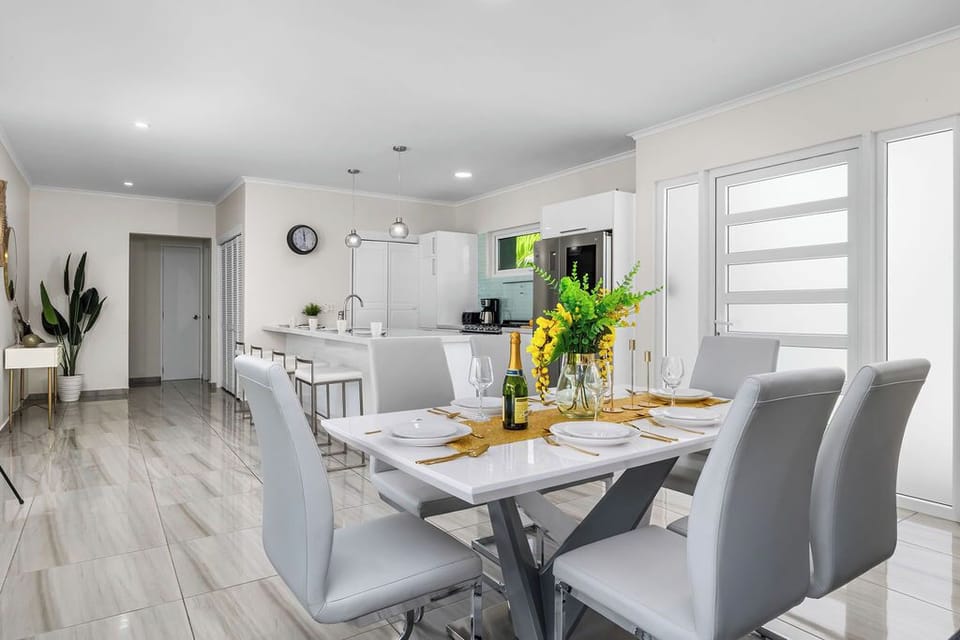 The dining area comfortably seats your group for meals, games, or late-night chats.