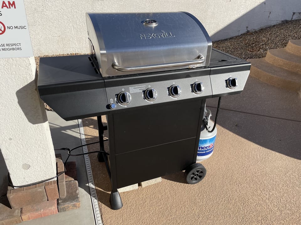 A sweet propane grill you can make some wings and burgers to perfection.