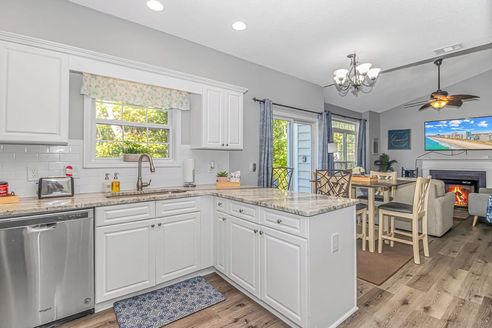 Open floor plan. Kitchen overlooking dining area and family room.