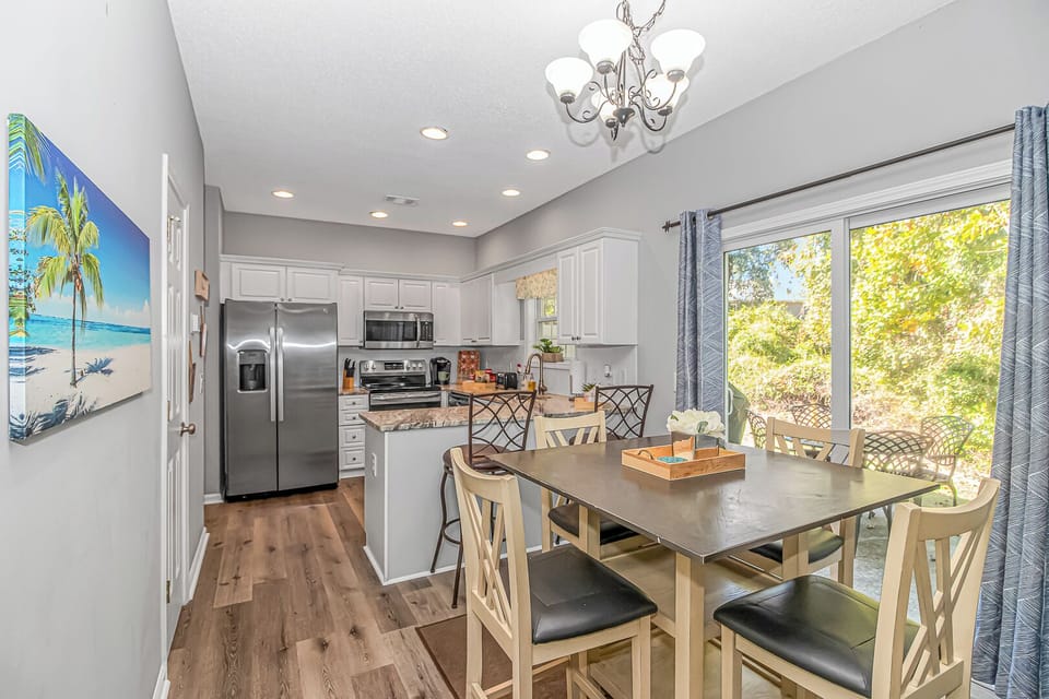 Dining. Sliding doors open unto patio