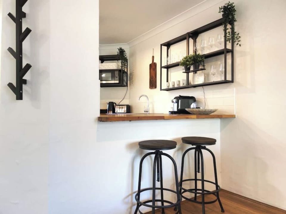 Kitchen bar with Stools great for having a quick breakfast