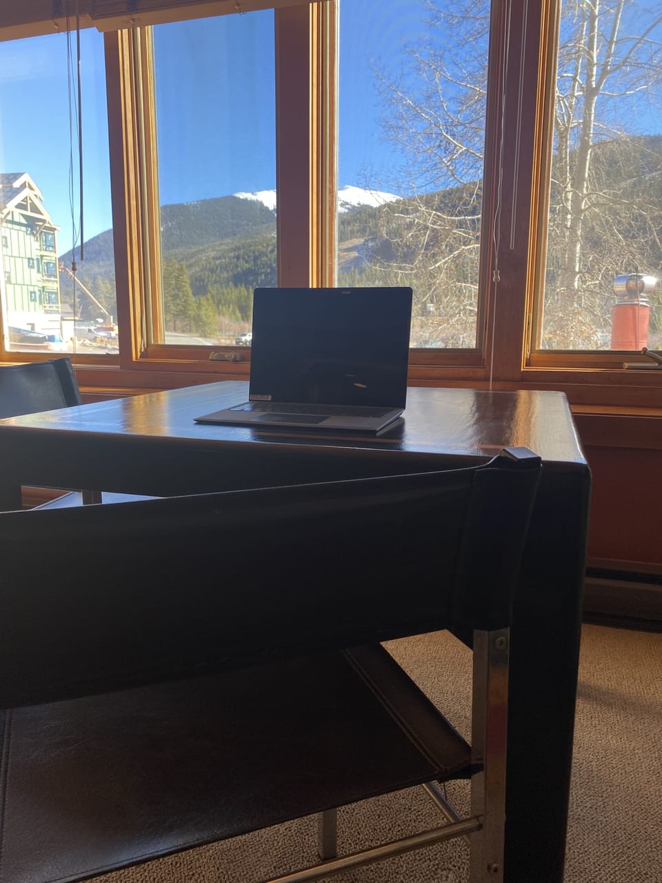 Workspace or game table overlooking ski resort