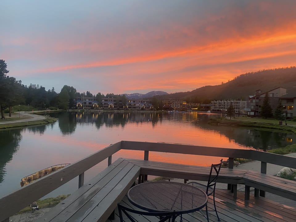 Pool house deck. Grills and lounge chairs provided