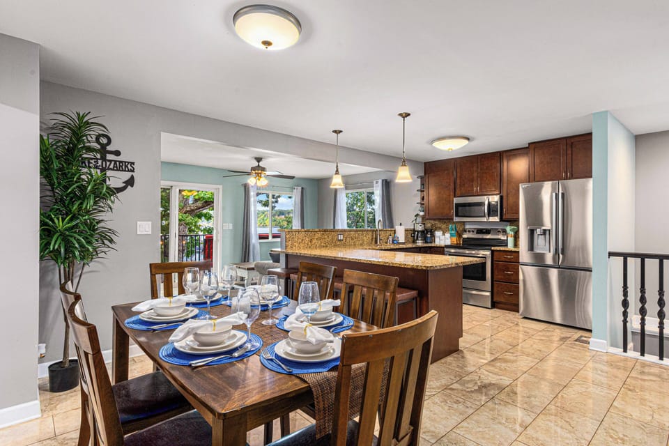 This open-concept kitchen is the ideal setup for a seamless and enjoyable vacation experience. The table seats 6 and the breakfast bar seats 4. 