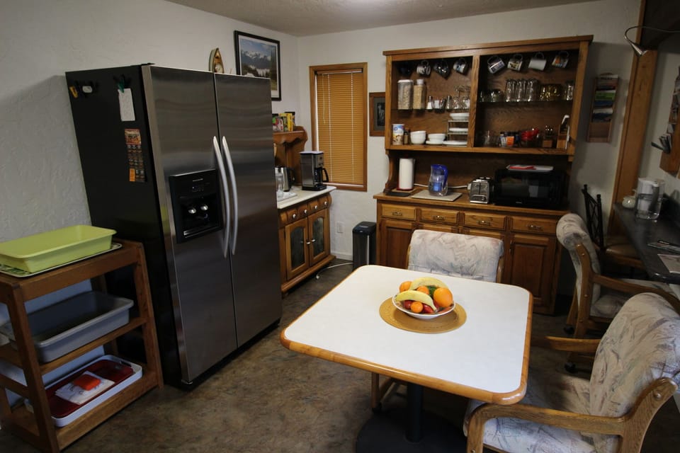 Dining nook. Full sized refrigerator. Coffee & tea bar.